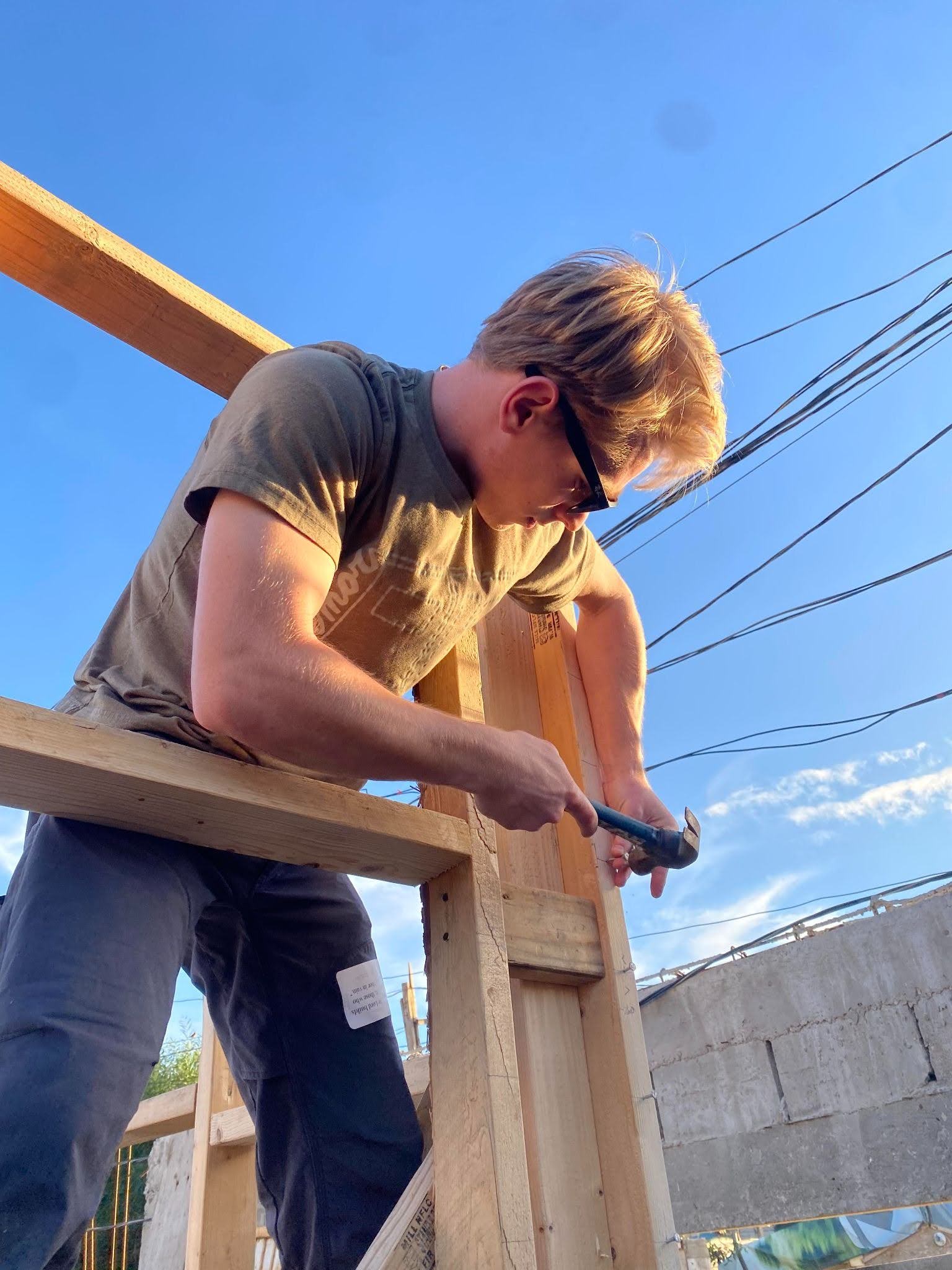 Aidan Steins working on a construction project outdoors